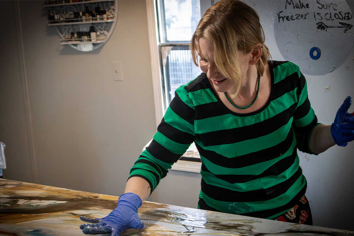 Painter working on an epoxy countertop